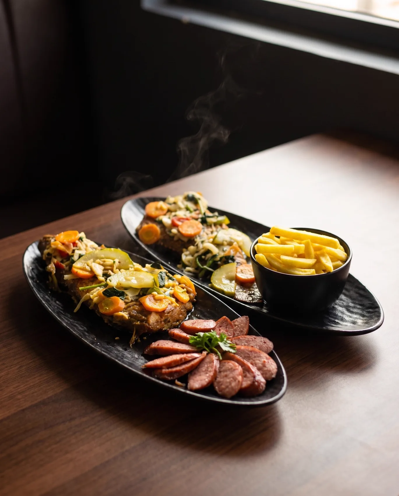 Filets de poisson, saucisson et frites